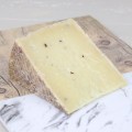 Spicchio di formaggio tartufato 250 gr circa